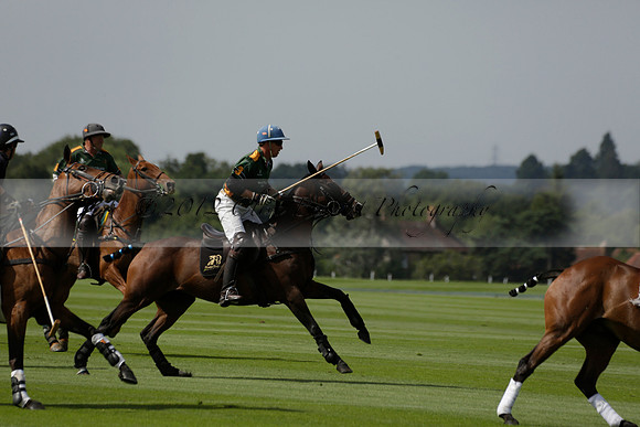 Maiz Dulce (green) v River (blue) in a Uber Polo Midsummer 12 goal polo match on Wednesday 21 August 2013 at Cowdray park Polo Club on Ambersham 2.  www.polopictures.co.uk