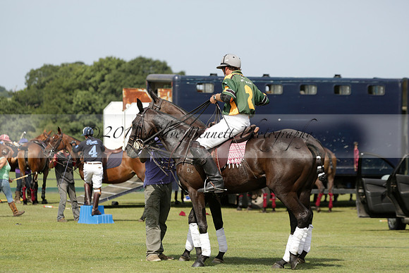 Maiz Dulce (green) v River (blue) in a Uber Polo Midsummer 12 goal polo match on Wednesday 21 August 2013 at Cowdray park Polo Club on Ambersham 2.  www.polopictures.co.uk