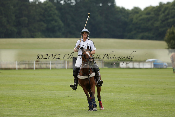 Beau Design v Boscom in an August Rother Cup 4 goal polo match at Cowdray Park Polo Club on Wednesday 07 August 2013
