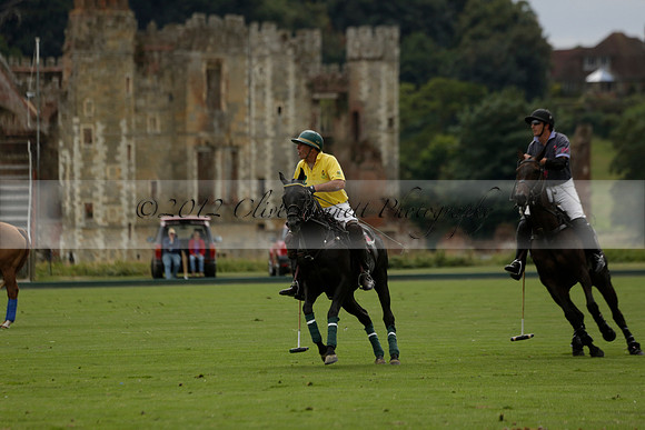La Tremenda (lilac) v Maiz Dulce (yellow) in a Brecknock Cup polo match played on Lawns 1 at the Cowdray Park Polo Club on Tuesday 13 August 2013