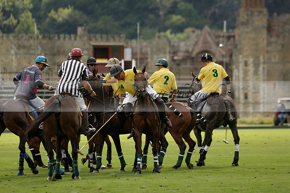 La Tremenda (lilac) v Maiz Dulce (yellow) in a Brecknock Cup polo match played on Lawns 1 at the Cowdray Park Polo Club on Tuesday 13 August 2013