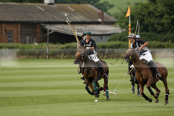 Beau Design v Boscom in an August Rother Cup 4 goal polo match at Cowdray Park Polo Club on Wednesday 07 August 2013