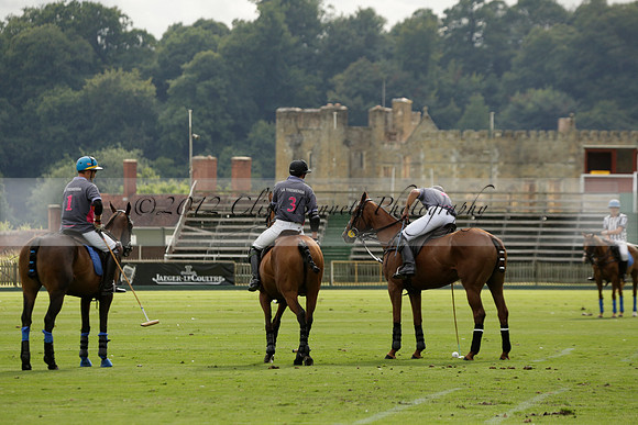 La Tremenda (lilac) v Maiz Dulce (yellow) in a Brecknock Cup polo match played on Lawns 1 at the Cowdray Park Polo Club on Tuesday 13 August 2013