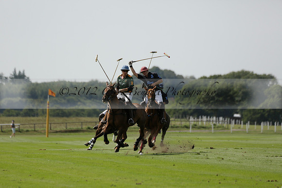Maiz Dulce (green) v River (blue) in a Uber Polo Midsummer 12 goal polo match on Wednesday 21 August 2013 at Cowdray park Polo Club on Ambersham 2.  www.polopictures.co.uk