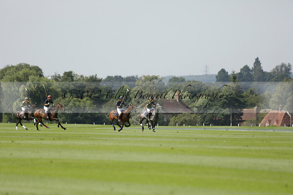 Maiz Dulce (green) v River (blue) in a Uber Polo Midsummer 12 goal polo match on Wednesday 21 August 2013 at Cowdray park Polo Club on Ambersham 2.  www.polopictures.co.uk