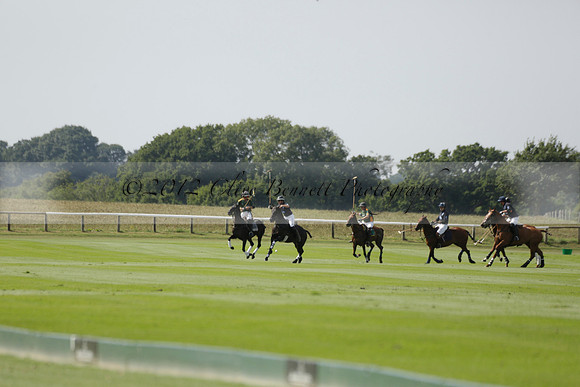 Maiz Dulce (green) v River (blue) in a Uber Polo Midsummer 12 goal polo match on Wednesday 21 August 2013 at Cowdray park Polo Club on Ambersham 2.  www.polopictures.co.uk