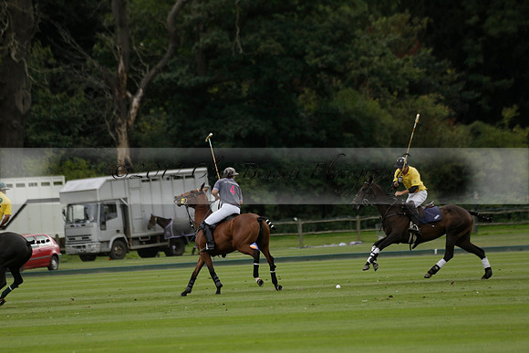 La Tremenda (lilac) v Maiz Dulce (yellow) in a Brecknock Cup polo match played on Lawns 1 at the Cowdray Park Polo Club on Tuesday 13 August 2013