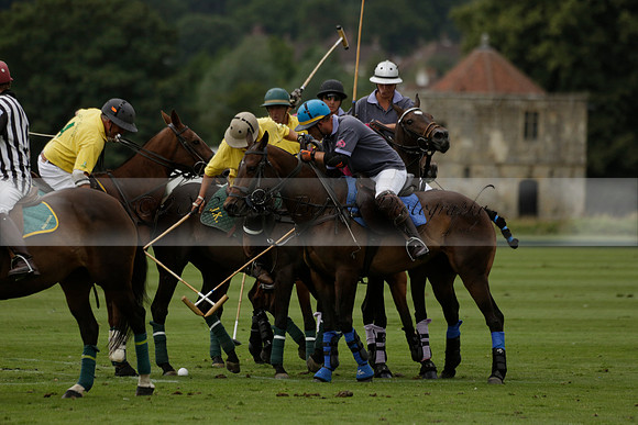 La Tremenda (lilac) v Maiz Dulce (yellow) in a Brecknock Cup polo match played on Lawns 1 at the Cowdray Park Polo Club on Tuesday 13 August 2013