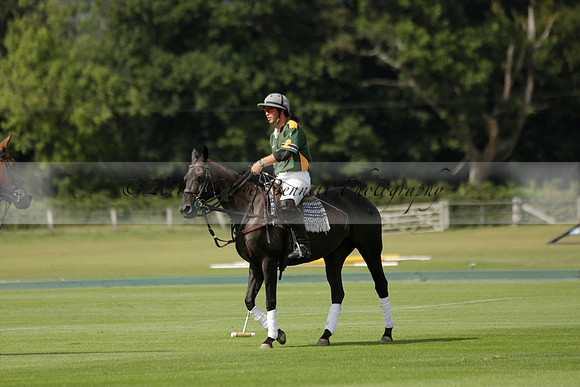 Maiz Dulce (green) v River (blue) in a Uber Polo Midsummer 12 goal polo match on Wednesday 21 August 2013 at Cowdray park Polo Club on Ambersham 2.  www.polopictures.co.uk