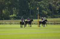 La Tremenda (mauve) v Maiz Dulce (green) in the Brecknock Cup  final polo match. Played at Cowdray Park Polo Club on Sunday 25 August 2013 on Ambersham 1. www.polopictures.co.uk