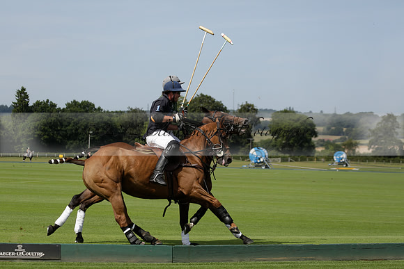Maiz Dulce (green) v River (blue) in a Uber Polo Midsummer 12 goal polo match on Wednesday 21 August 2013 at Cowdray park Polo Club on Ambersham 2.  www.polopictures.co.uk