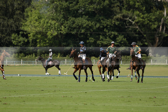 Maiz Dulce (green) v River (blue) in a Uber Polo Midsummer 12 goal polo match on Wednesday 21 August 2013 at Cowdray park Polo Club on Ambersham 2.  www.polopictures.co.uk