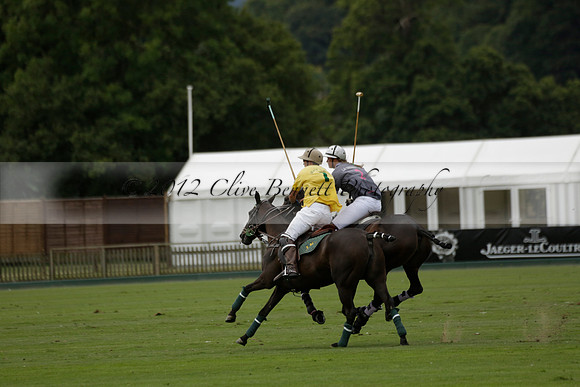 La Tremenda (lilac) v Maiz Dulce (yellow) in a Brecknock Cup polo match played on Lawns 1 at the Cowdray Park Polo Club on Tuesday 13 August 2013
