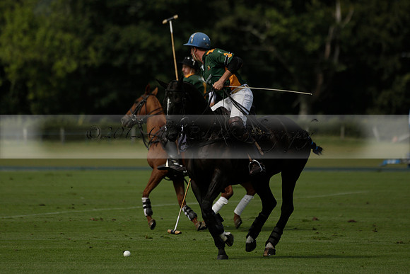 Maiz Dulce (green) v River (blue) in a Uber Polo Midsummer 12 goal polo match on Wednesday 21 August 2013 at Cowdray park Polo Club on Ambersham 2.  www.polopictures.co.uk