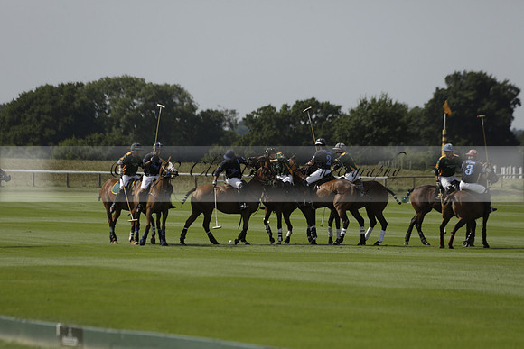 Maiz Dulce (green) v River (blue) in a Uber Polo Midsummer 12 goal polo match on Wednesday 21 August 2013 at Cowdray park Polo Club on Ambersham 2.  www.polopictures.co.uk