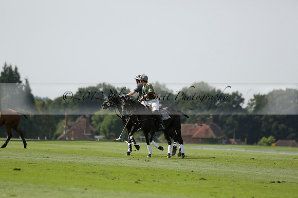 Maiz Dulce (green) v River (blue) in a Uber Polo Midsummer 12 goal polo match on Wednesday 21 August 2013 at Cowdray park Polo Club on Ambersham 2.  www.polopictures.co.uk