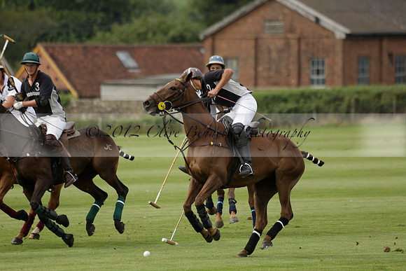 Beau Design v Boscom in an August Rother Cup 4 goal polo match at Cowdray Park Polo Club on Wednesday 07 August 2013