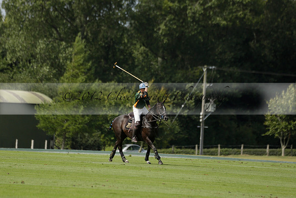 Maiz Dulce (green) v River (blue) in a Uber Polo Midsummer 12 goal polo match on Wednesday 21 August 2013 at Cowdray park Polo Club on Ambersham 2.  www.polopictures.co.uk