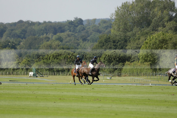 Maiz Dulce (green) v River (blue) in a Uber Polo Midsummer 12 goal polo match on Wednesday 21 August 2013 at Cowdray park Polo Club on Ambersham 2.  www.polopictures.co.uk