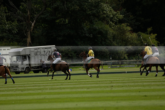 La Tremenda (lilac) v Maiz Dulce (yellow) in a Brecknock Cup polo match played on Lawns 1 at the Cowdray Park Polo Club on Tuesday 13 August 2013