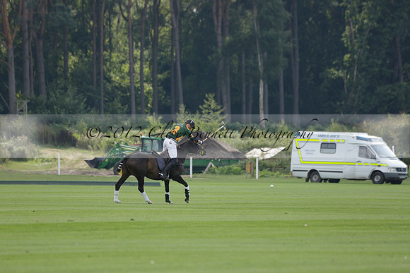 La Tremenda (mauve) v Maiz Dulce (green) in the Brecknock Cup  final polo match. Played at Cowdray Park Polo Club on Sunday 25 August 2013 on Ambersham 1. www.polopictures.co.uk