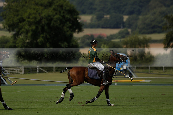 Maiz Dulce (green) v River (blue) in a Uber Polo Midsummer 12 goal polo match on Wednesday 21 August 2013 at Cowdray park Polo Club on Ambersham 2.  www.polopictures.co.uk