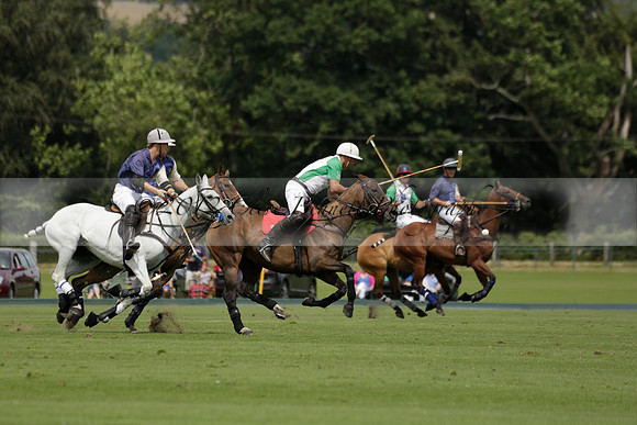 Burningfold (blue) v Wairakei Pastoral (green) in the Ruins Cup Final on Sunday 04 August 2013.