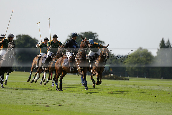 Maiz Dulce (green) v River (blue) in a Uber Polo Midsummer 12 goal polo match on Wednesday 21 August 2013 at Cowdray park Polo Club on Ambersham 2.  www.polopictures.co.uk