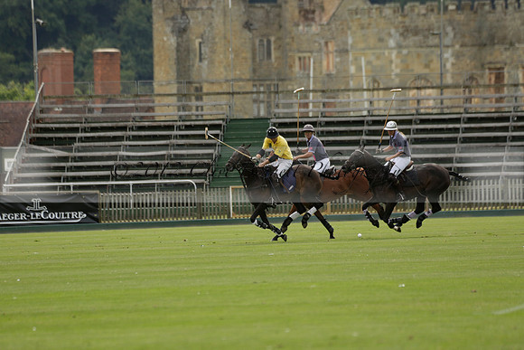 La Tremenda (lilac) v Maiz Dulce (yellow) in a Brecknock Cup polo match played on Lawns 1 at the Cowdray Park Polo Club on Tuesday 13 August 2013