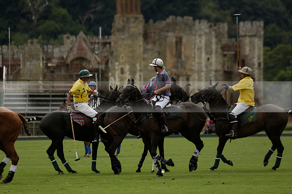 La Tremenda (lilac) v Maiz Dulce (yellow) in a Brecknock Cup polo match played on Lawns 1 at the Cowdray Park Polo Club on Tuesday 13 August 2013