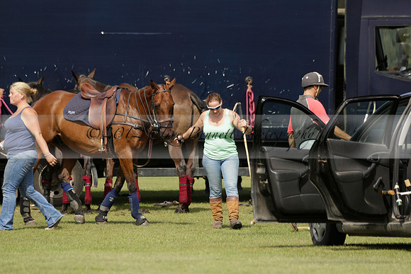Maiz Dulce (green) v River (blue) in a Uber Polo Midsummer 12 goal polo match on Wednesday 21 August 2013 at Cowdray park Polo Club on Ambersham 2.  www.polopictures.co.uk