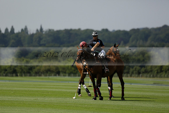 Maiz Dulce (green) v River (blue) in a Uber Polo Midsummer 12 goal polo match on Wednesday 21 August 2013 at Cowdray park Polo Club on Ambersham 2.  www.polopictures.co.uk