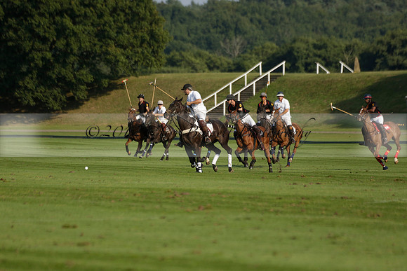 Pluma Negra (white) v Shoreline (black) in the Brecknock Cup Subsidiary final polo match played on Sunday 25 August 2013 at Cowdray Park Polo Club on Ambersham 1. 2013.10.12 www.polopictures.co.uk