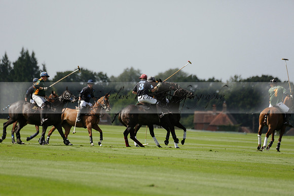 Maiz Dulce (green) v River (blue) in a Uber Polo Midsummer 12 goal polo match on Wednesday 21 August 2013 at Cowdray park Polo Club on Ambersham 2.  www.polopictures.co.uk