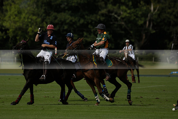 Maiz Dulce (green) v River (blue) in a Uber Polo Midsummer 12 goal polo match on Wednesday 21 August 2013 at Cowdray park Polo Club on Ambersham 2.  www.polopictures.co.uk