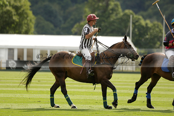 La Tremenda (lilac) v Maiz Dulce (yellow) in a Brecknock Cup polo match played on Lawns 1 at the Cowdray Park Polo Club on Tuesday 13 August 2013