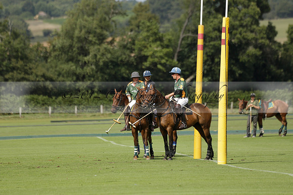 Maiz Dulce (green) v River (blue) in a Uber Polo Midsummer 12 goal polo match on Wednesday 21 August 2013 at Cowdray park Polo Club on Ambersham 2.  www.polopictures.co.uk