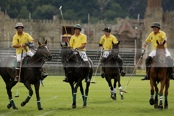 La Tremenda (lilac) v Maiz Dulce (yellow) in a Brecknock Cup polo match played on Lawns 1 at the Cowdray Park Polo Club on Tuesday 13 August 2013