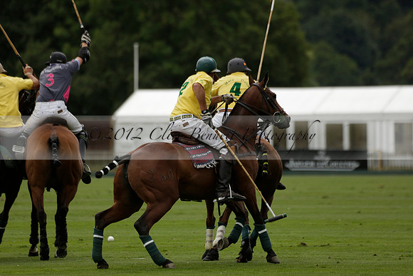 La Tremenda (lilac) v Maiz Dulce (yellow) in a Brecknock Cup polo match played on Lawns 1 at the Cowdray Park Polo Club on Tuesday 13 August 2013