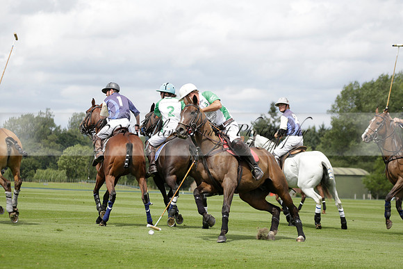 Burningfold (blue) v Wairakei Pastoral (green) in the Ruins Cup Final on Sunday 04 August 2013.