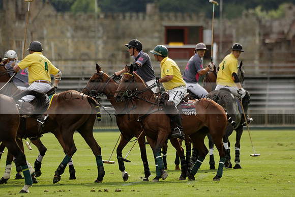 La Tremenda (lilac) v Maiz Dulce (yellow) in a Brecknock Cup polo match played on Lawns 1 at the Cowdray Park Polo Club on Tuesday 13 August 2013