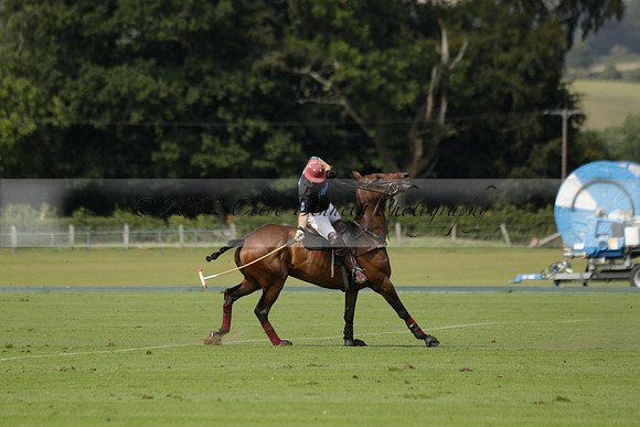 Maiz Dulce (green) v River (blue) in a Uber Polo Midsummer 12 goal polo match on Wednesday 21 August 2013 at Cowdray park Polo Club on Ambersham 2.  www.polopictures.co.uk