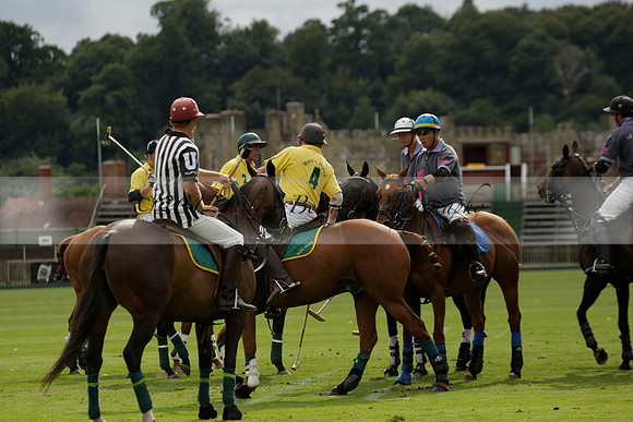 La Tremenda (lilac) v Maiz Dulce (yellow) in a Brecknock Cup polo match played on Lawns 1 at the Cowdray Park Polo Club on Tuesday 13 August 2013