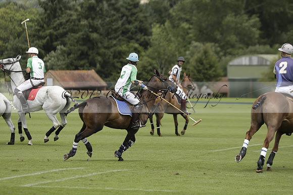 Burningfold (blue) v Wairakei Pastoral (green) in the Ruins Cup Final on Sunday 04 August 2013.