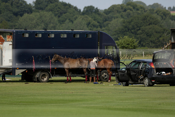 Maiz Dulce (green) v River (blue) in a Uber Polo Midsummer 12 goal polo match on Wednesday 21 August 2013 at Cowdray park Polo Club on Ambersham 2.  www.polopictures.co.uk