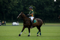 La Tremenda (mauve) v Maiz Dulce (green) in the Brecknock Cup  final polo match. Played at Cowdray Park Polo Club on Sunday 25 August 2013 on Ambersham 1. www.polopictures.co.uk