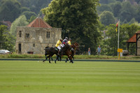 La Tremenda (lilac) v Maiz Dulce (yellow) in a Brecknock Cup polo match played on Lawns 1 at the Cowdray Park Polo Club on Tuesday 13 August 2013