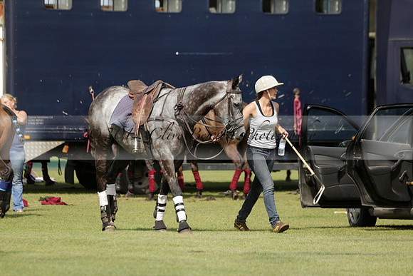 Maiz Dulce (green) v River (blue) in a Uber Polo Midsummer 12 goal polo match on Wednesday 21 August 2013 at Cowdray park Polo Club on Ambersham 2.  www.polopictures.co.uk