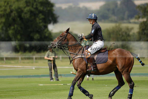 Maiz Dulce (green) v River (blue) in a Uber Polo Midsummer 12 goal polo match on Wednesday 21 August 2013 at Cowdray park Polo Club on Ambersham 2.  www.polopictures.co.uk