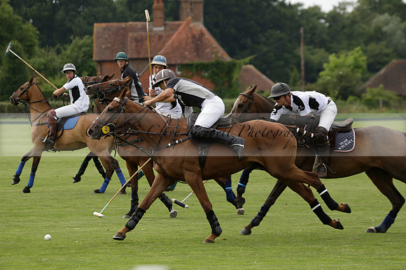 Beau Design v Boscom in an August Rother Cup 4 goal polo match at Cowdray Park Polo Club on Wednesday 07 August 2013